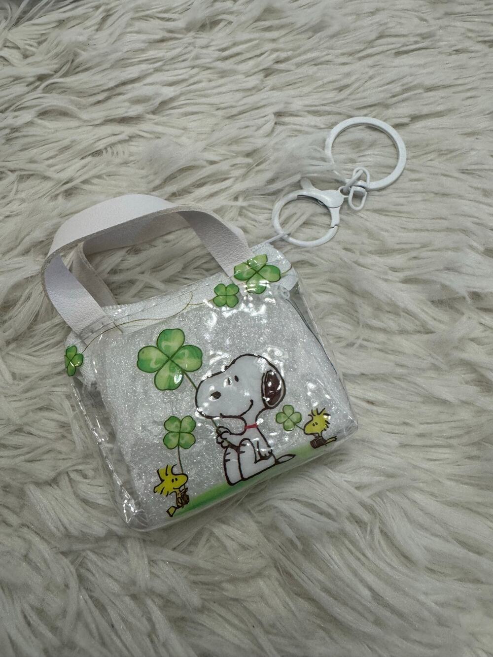 Snoopy clear mini purse keychain green shamrocks Snoopy holding a shamrock